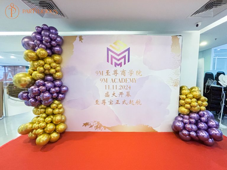 Wooden timber frame backdrop dressed with balloon garland for an event
